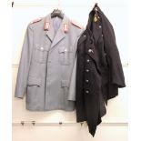 Two vintage uniform jackets.