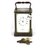 A brass alarm carriage clock, H. 16cm. Condition : Understood to be in working order.