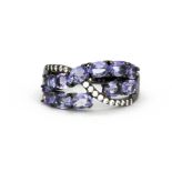 A 925 silver tanzanite and white stone set ring, (N.5).