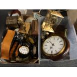 Two boxes of clocks and other items.