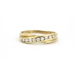 A 9ct yellow gold stone set ring, (O.5).