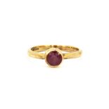 A 9ct yellow gold ruby set ring, (L).