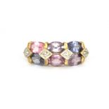 A 9ct yellow gold ring set with amethyst, pink tourmaline, iolite and diamond, (N).