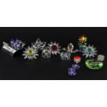 A collection of boxed Swarovski crystal floral items.