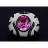 A 925 silver and marcasite enamelled ring set with an oval cut pink stone, (N.5).