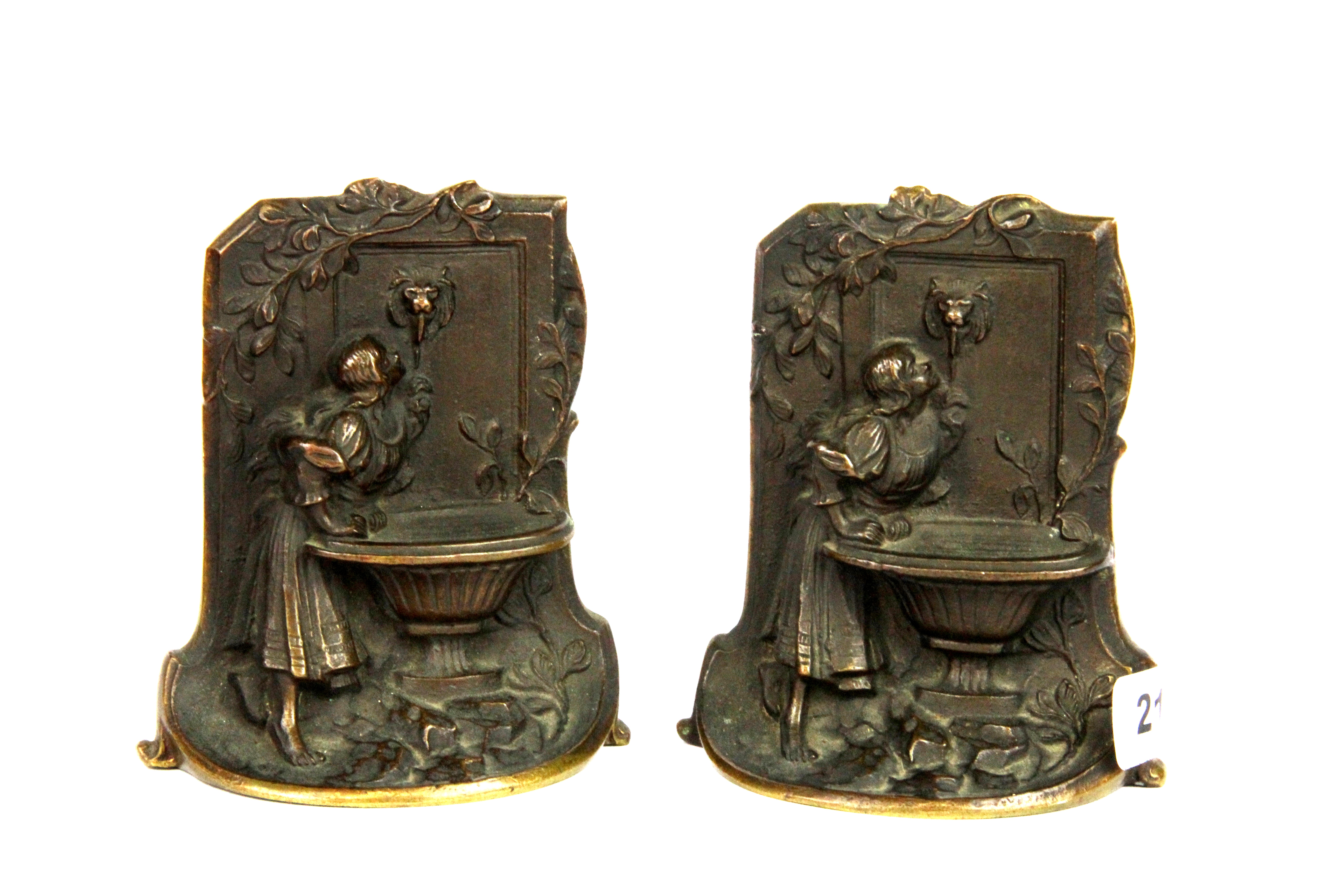 A pair of 1920's bronze bookends, H. 14cm.