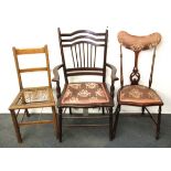 Two upholstered mahogany chairs and a further bedroom chair.