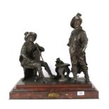 A superb 19th Century French bronze figure of two cavaliers on a red marble base by E. Drouot,