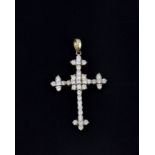 A 14ct yellow gold stone set cross pendant, L. 4cm.