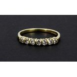 An 18ct yellow gold half eternity ring set wit brilliant cut diamonds, approx. 0.55ct overall, (N).