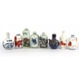 A group of eight Chinese porcelain snuff bottles and one bowl, tallest snuff bottle 9cm.