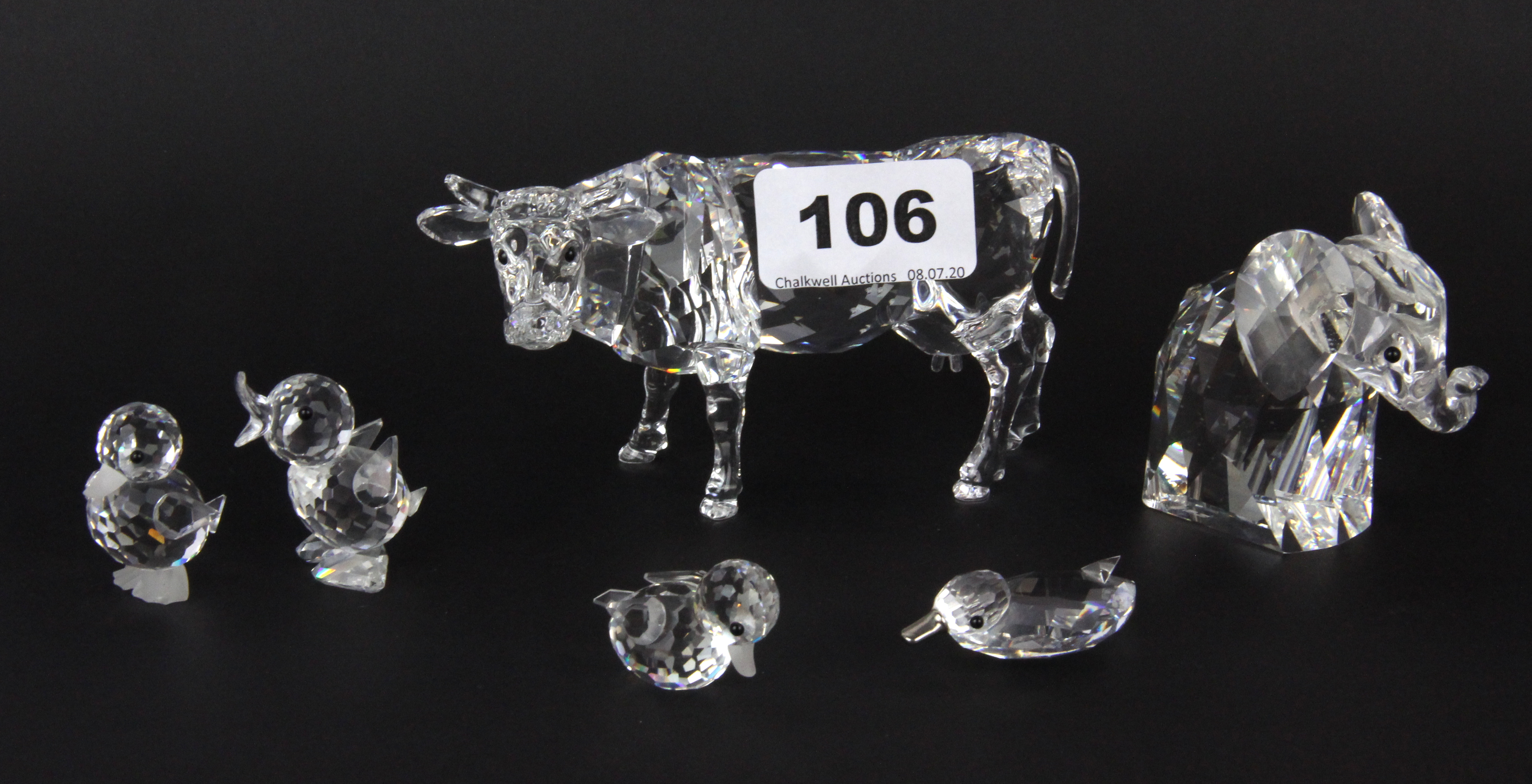 Six boxed Swarovski crystal figures, cow L. 11.5cm.
