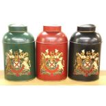 Three large Toleware metal tea caddies, H. 44cm.