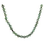 A single strand necklace of jade beads, bead size 5.5mm necklace L. 54cm.