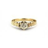 A 9ct yellow gold diamond set solitaire ring, (M).