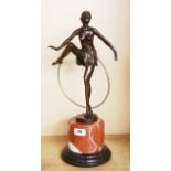 An Art Deco style bronze and marble figure of a girl dancing with a hoop after D. Alonso, H. 47cm.