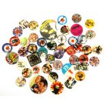 A quantity of vintage pop culture badges including The Jam, Style Council etc.