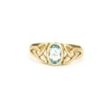 A 9ct yellow gold ring set with an oval cut ring, (N).