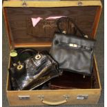 A vintage pig skin suitcase and vintage handbag contents, case size 36 x 55 x 18cm.