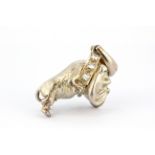 A 925 silver dog shaped pendant, L. 3.5cm.