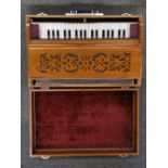 An interesting cased Indian hand pumped organ, case 39 x 63 x 19cm.