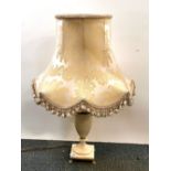 An alabaster table lamp and silk shade, H. 76cm.