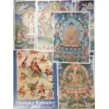 A quantity of printed thangkas on fabric together with a 2003 calendar of thangka art.