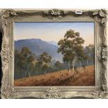 A framed oil on canvas Highland scene signed DC Garner.