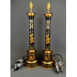 An impressive pair of toleware decorated metal column table lamps, H.60cm.