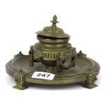 A 19th Century bronze/ brass inkwell, W. 20cm H. 12cm.