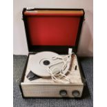 A vintage Dansette portable record player, 32 x 27 x 17cm.