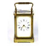 A French striking brass carriage clock, H. 18cm. Condition : Currently working mechanically but