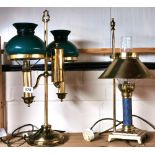 Two brass desk lamps.