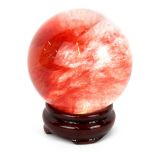 A rare polished rock fire crystal ball, Dia. 8cm.