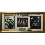 A framed collage of Beatles memorabilia, mostly reproduced items.