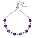 A 925 silver amethyst and white stone set adjustable bracelet.