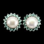 A pair of 925 silver stud earrings set with pearls surrounded by blue apatites, Dia. 1.2cm.