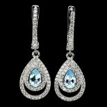 A pair of 925 silver drop earrings set with pear cut Swiss blue topaz and white stones, L. 2.8cm.