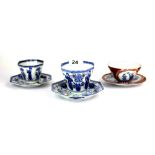 Three fine Japanese porcelain hand painted tea bowls and saucers, tallest 8cm.