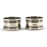 A pair of hallmarked silver napkin rings.