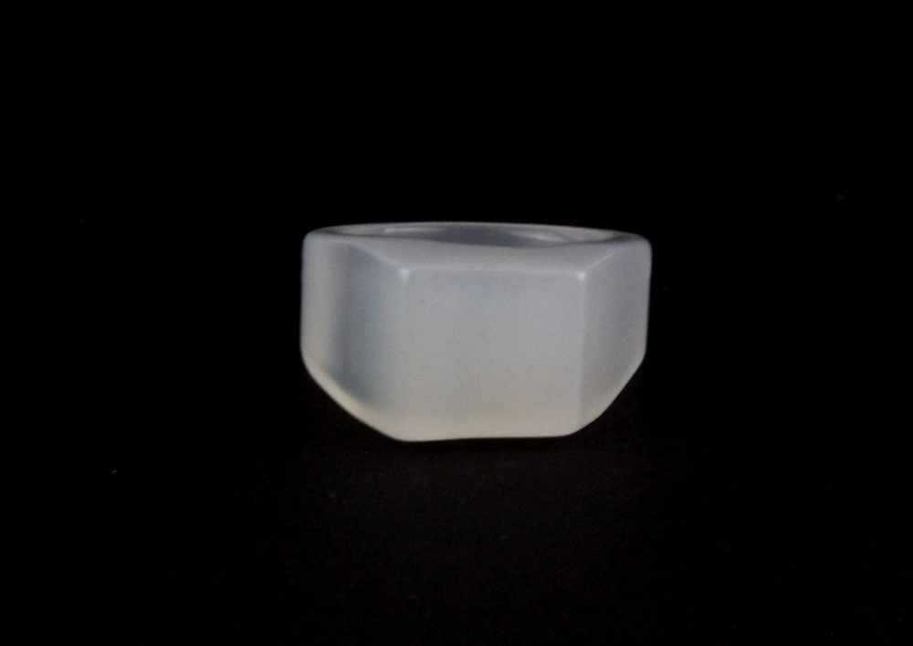A Chinese polished white jade/hardstone gents signet ring, ring size - W, signet area size 1.5 x 1.