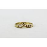 A 10ct yellow gold (stamped 10k) stone set ring, (M).