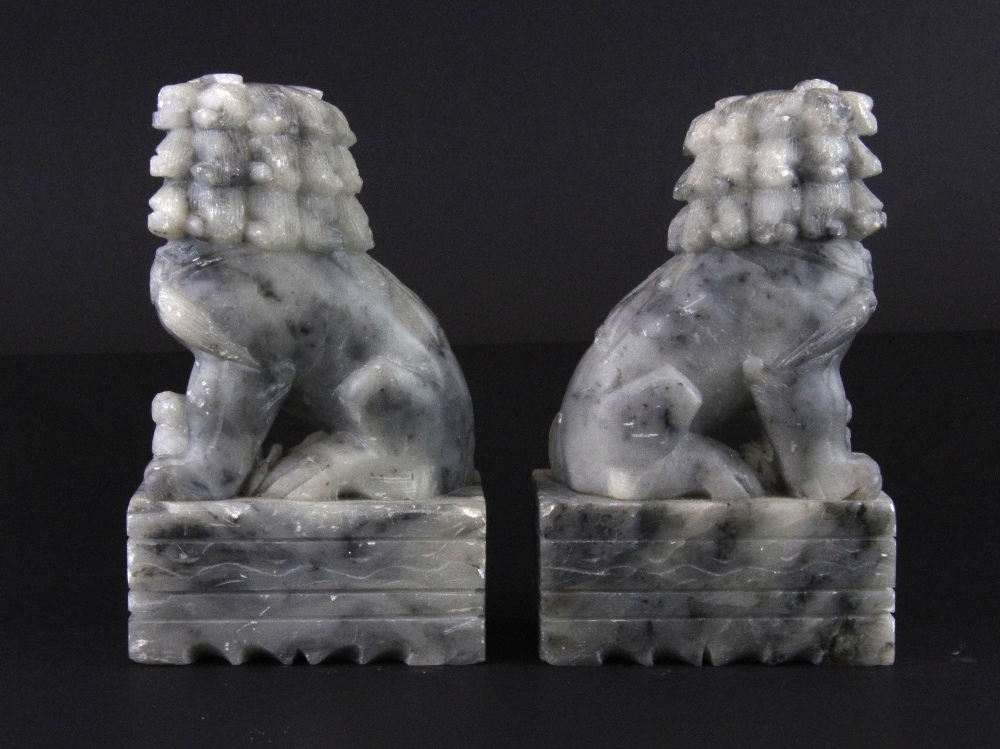 A pair of Chinese carved soapstone lion dog figures, H. 12cm. - Image 2 of 3