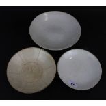 Three Chinese Song dynasty style incised porcelain plates.