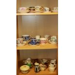 A collection of early English porcelain cups, saucers, plates and milk jugs.