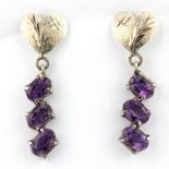 A pair of 950 silver amethyst set drop earrings.