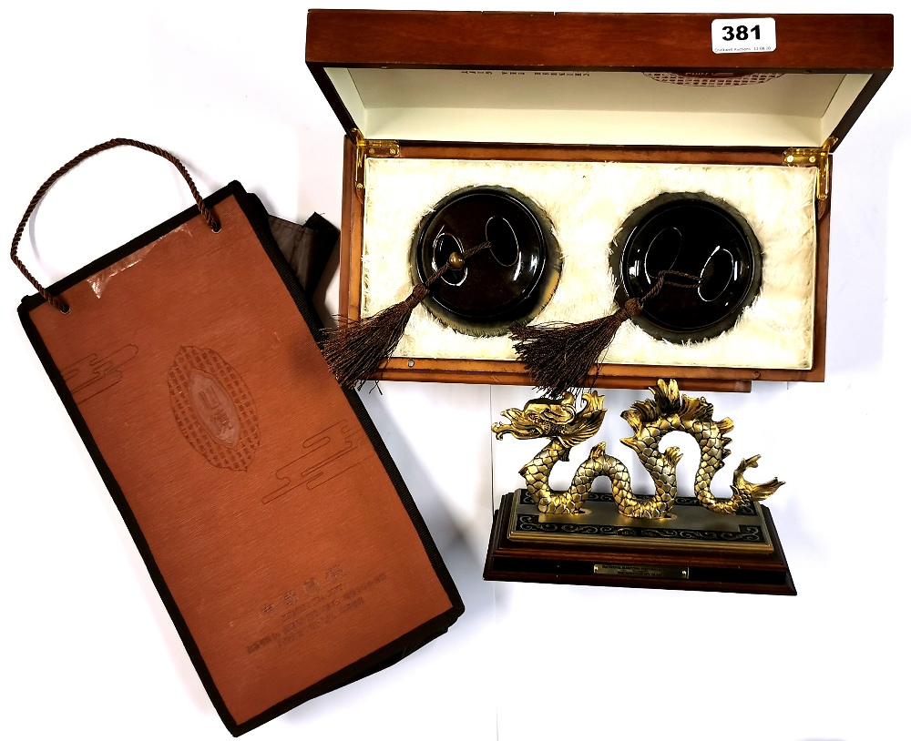 A Chinese presentation tea box (no tea) and a National Maritime dragon.