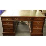 A leather topped mahogany desk, W. 152cm D. 90cm H. 78cm.