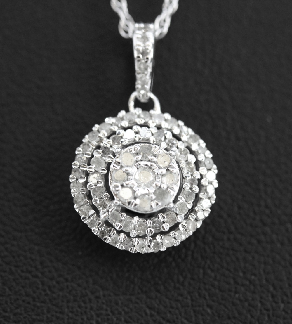 A 925 silver diamond set pendant and chain, L. 2cm, approx. 0.40ct overall.
