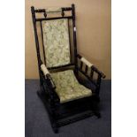 A 19th Century bobbin turned rocking chair.